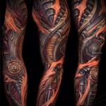 menő biomechanikai tetoválás a karon - - férfi váll tetoválás