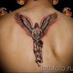 tatu-na-pozvonochnike-risunok-vdol-primer-foto-038-tatufoto-ru