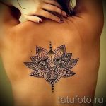 tatu-na-pozvonochnike-risunok-vdol-primer-foto-044-tatufoto-ru