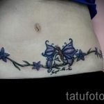 Tätowierung auf der Narbe von Appendizitis - Снимка Beispiel des fertigen Tätowierung 01092016 1004 tatufoto.com