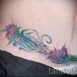 Tätowierung auf der Narbe von Appendizitis - Снимка Beispiel des fergent Tätowierung 01092016 2005 tatufoto.ru