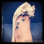 татуировка на птица на крака 4