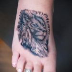 татуировка на лъв на крак 1