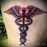 Caduceus tetoválás fotó - tetováló amulett a jó szerencséhez 1184 tatufoto.ru