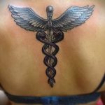 Caduceus tetoválás fotó - tetoválás szimbólum a szerencse és a gazdagság fotó 1196 tatufoto.ru