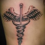 Caduceus tetoválás fotó - tetoválás szimbólum a szerencse és a gazdagság fotó 4199 tatufoto.ru