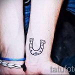 Patkó tetoválás fotó - tetoválás a boldogsághoz és a szerelemhez 1299 tatufoto.ru