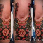 Patkó tetoválás fotó - tetoválás a boldogsághoz és a szerelemhez 8306 tatufoto.ru
