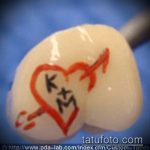 tetoválás a fogakon # 189 a minta klassz változata, amely könnyen használható feldolgozásra és tetoválásként történő alkalmazásra a fogakon