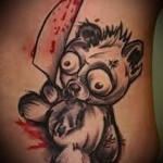 mackó tetoválás véres késsel