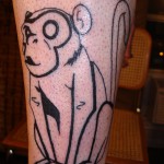 Majom tetoválás a lábán