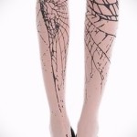 pókháló tetoválás az 1 lábán