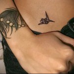 toll tetoválás a karon