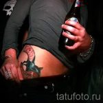 Tattoo -Pistole für Mädchen - ein Foto des fertigen Tätowierung 01092016 2058 tatufoto.ru