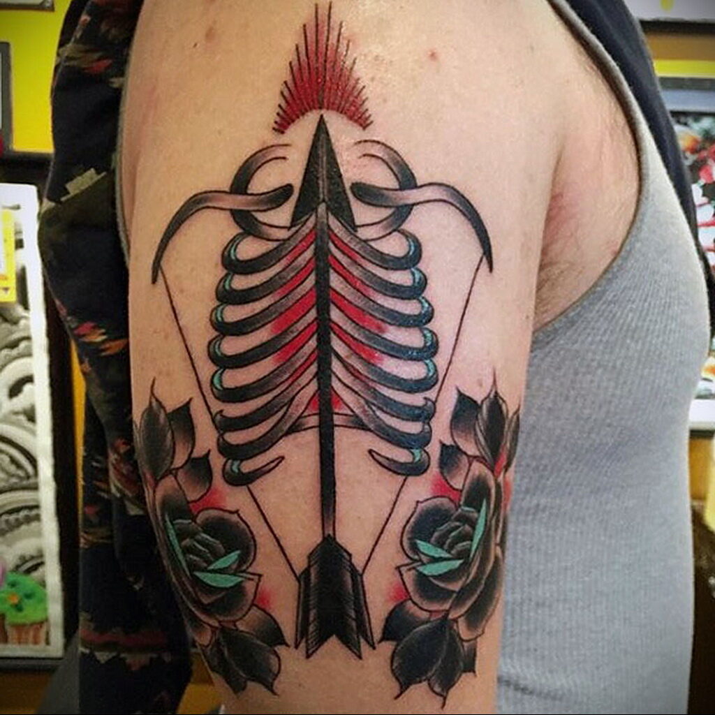 Fotó a Starets tetoválás példájáról 02.02.2021 №0173 - Nyilas tetoválás -