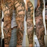 كم الوشم مع البحر والسفينة - وشم للبحار