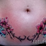 Sakura tetoválás a hasán - Fotó példa a 12122015 számra 4