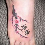 sakura és hieroglifák tetoválása - fotó példa 12122015 -ből, 3. sz