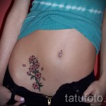 sakura tetoválás a gyomorban - fotó példa 12122015 № 11