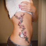 sakura tetoválás az oldalán - fotó példa 12122015 -ből 3. sz