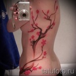 sakura tetoválás az oldalán - fotó példa 12122015 -ből, 4. sz