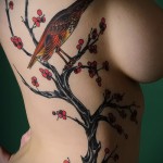 sakura tetoválás az oldalán - fotó példa 12122015 6. szám