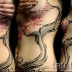 sakura tetoválás az oldalán - fotó példa 12122015 -ből, 7. sz