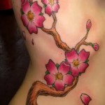 sakura tetoválás az oldalon - fotó példa 12122015 8. szám