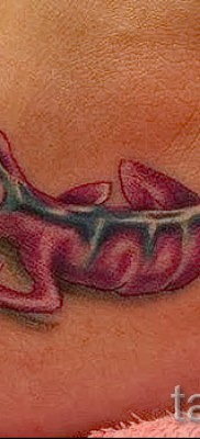 Szalamandra tetoválás fotó - a láb alján, a csont közelében készült