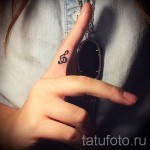 Treble Clef Tattoo On Finger 3 Pics