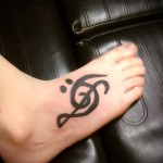 Treble Clef Tattoo On Leg 2 Photos