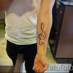 Treble Clef Tattoo On Hand 2 Photos