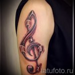 Treble Clef Tattoo On Hand 4 Photos