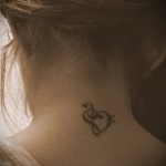 Treble Clef Tattoo on Neck 1 Photo