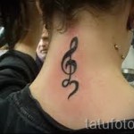 Treble Clef Tattoo on Neck 2 Photos