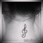 Treble Clef Tattoo on Neck 6 Photos