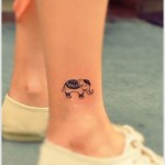 Татуировка на слон за езда на подбедрицата