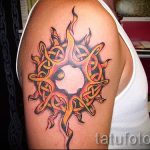 Sonne Tätowierung auf seinem Arm - ein kühles Foto des fertigen Tätowierung 14072016 2