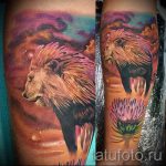 Oroszlán és nap tetoválás - fotó