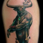 Fotó a kész tetoválás a csillagjegy Bika - egy istenség, amely úgy néz ki, mint egy férfi