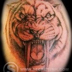 tiger grin tatovering - sabeltandet tiger med lange hugtænder