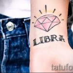 Mérleg tetoválás egy lánynak - fotó példa 13122015 -ből 5. sz