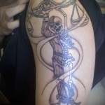 Mérleg tetoválás a karon - fotó példa 13122015 -ből, 3. sz