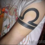 Mérleg tetoválás a karon - fotó példa 13122015 17. szám