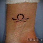 Mérleg tetoválás a karon - fotó példa 13122015 20. szám