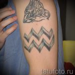 Vízöntő tetoválás a kezén - fotó - példa a kész tetoválásra 01082016 3140 tatufoto.ru
