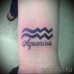 tetoválás vízöntő felirat - fotó - példa egy kész tetoválásra 01082016 1146 tatufoto.ru