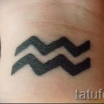 Vízöntő tetováló fotó - egy példa a kész tetoválásra a 01082016 2162 tatufoto.ru oldalról