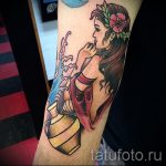 Vízöntő tetoválás az alkarján - fotó - példa a kész tetoválásra 01082016 2029 tatufoto.ru