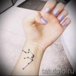 Wassermann Tattoo auf ihrem Handgelenk - ein Foto - ein Beispiel für die fertigen Tätowierung 01082016 1057 tatufoto.com
